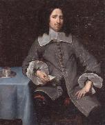 unknow artist Portrait of a gentleman,three-quarter length,standing beside a table oil on canvas